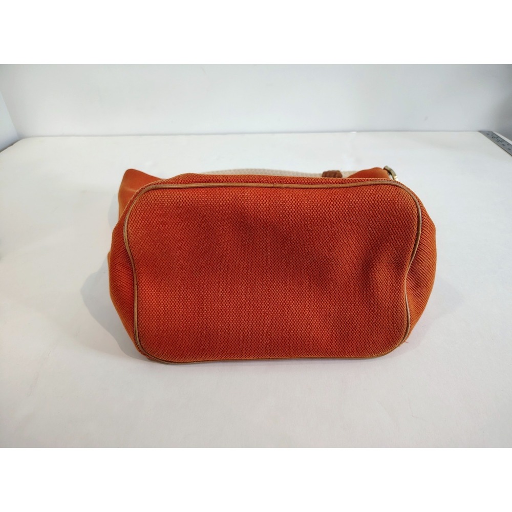 Michael Kors Marina hobo bag features an orange canvas body with braided rope... - Picture 5 of 11